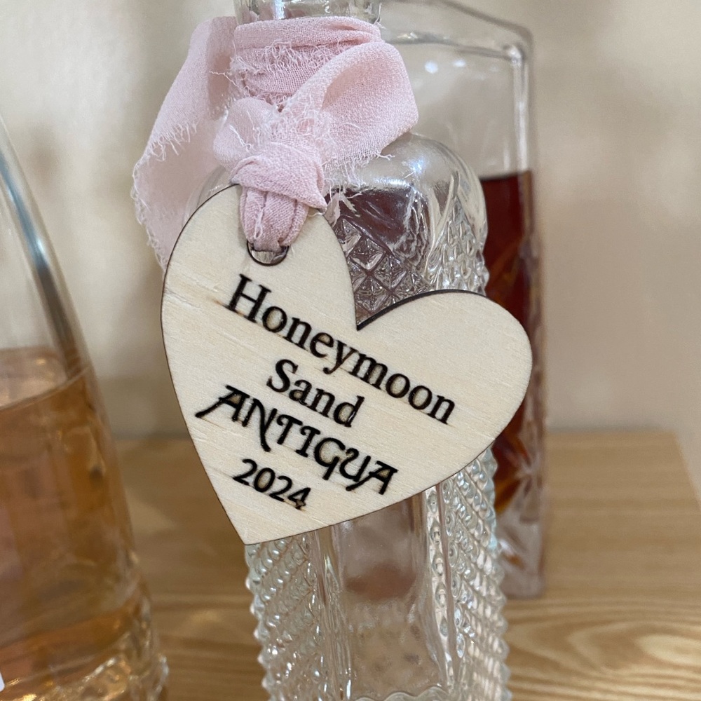 Personalized Honeymoon Sand Collection Bottles.